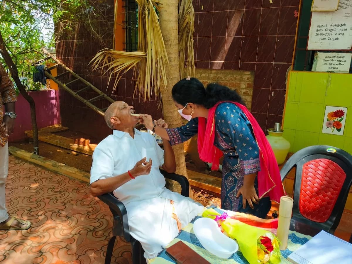 Dr. Pinky Vijay performing dental care